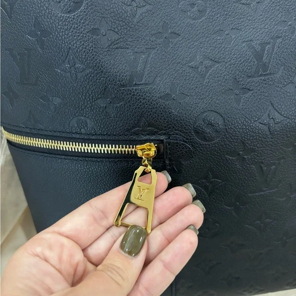 Authentic Louis Vuitton NEW MELIE Empreinte black with 2 straps discontinued